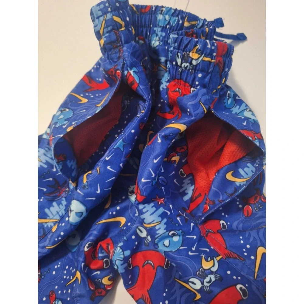 Nike Boys Medium 10-12 Swim Trunks Blue Shark Fish Print Mesh Lined Swoosh